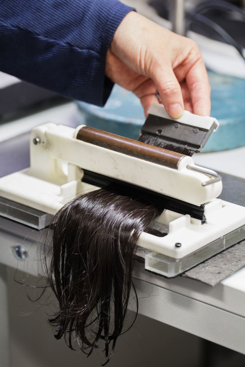 A young designer looks at his invention for the James Dyson Award.